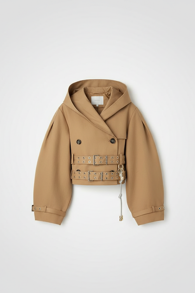 Black hooded crop trench coat, close-up of lapel.