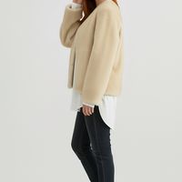 Solid plush coat, back view on model.