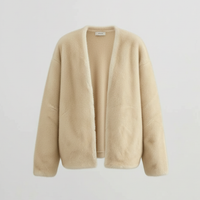 Solid plush coat, sleeve cuff detail.