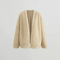 Solid plush coat, hem detail.