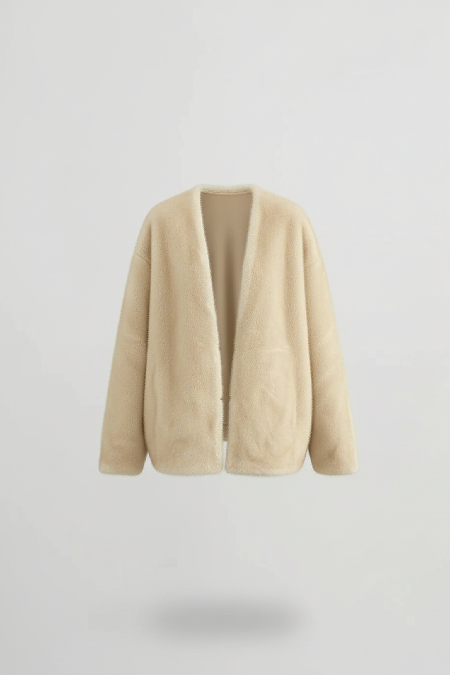 Solid plush coat, hem detail.
