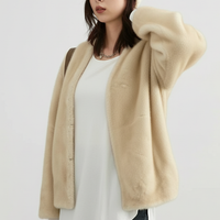 Solid plush coat, front view on model.