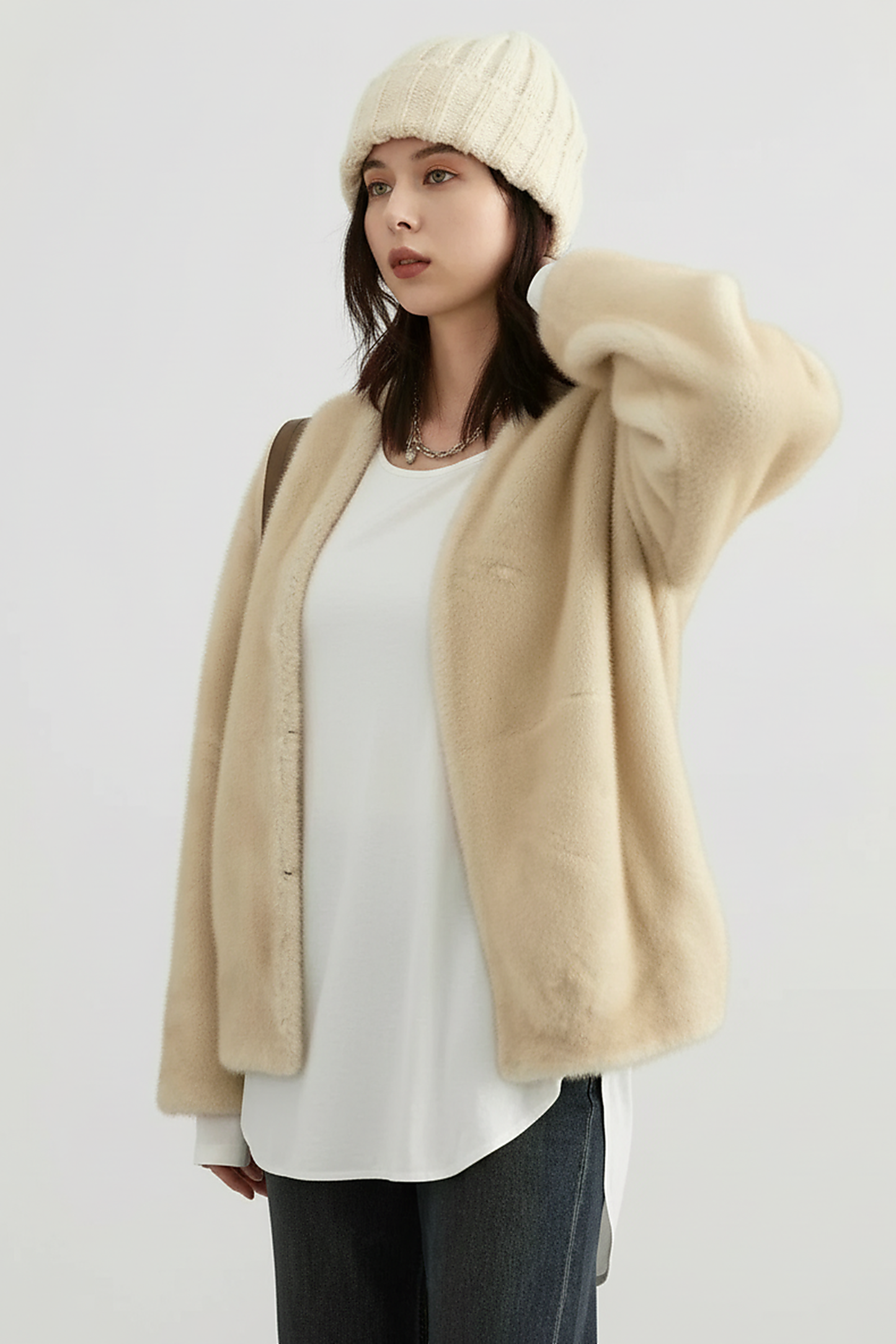 Solid plush coat, front view on model.