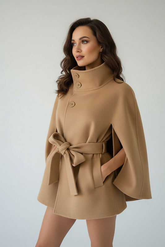 Vintage cape jacket with belt, front view on model.