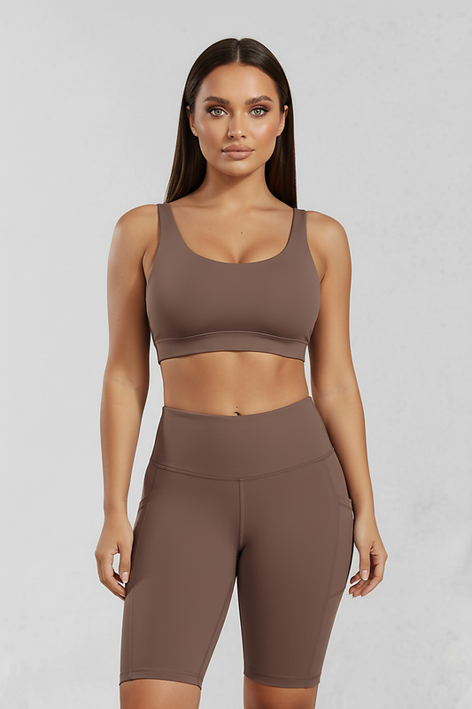 Solid yoga shorts with pockets, alternate angle view on model.