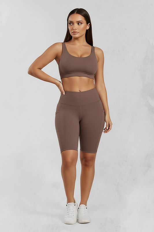 Solid yoga shorts with pockets, front view on model.