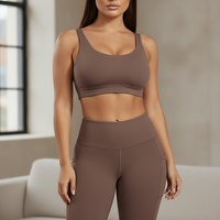 Solid yoga shorts with pockets, indoor lifestyle view on model.