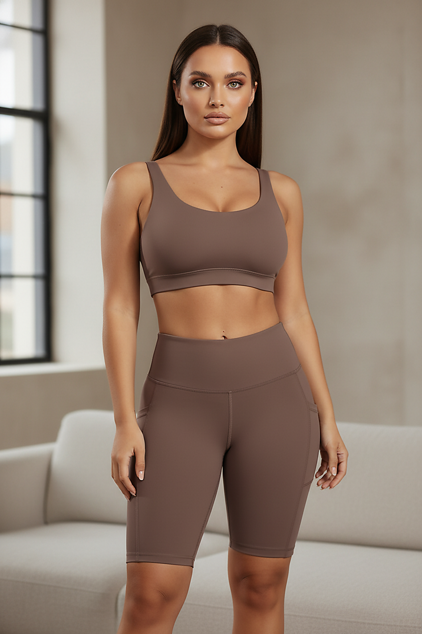 Solid yoga shorts with pockets, indoor lifestyle view on model.