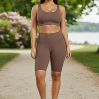 Solid yoga shorts with pockets, outdoor lifestyle view on model.