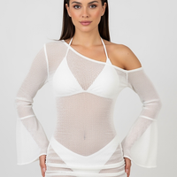 woman wearing black ruched mini dress, front view, standing, hands relaxed