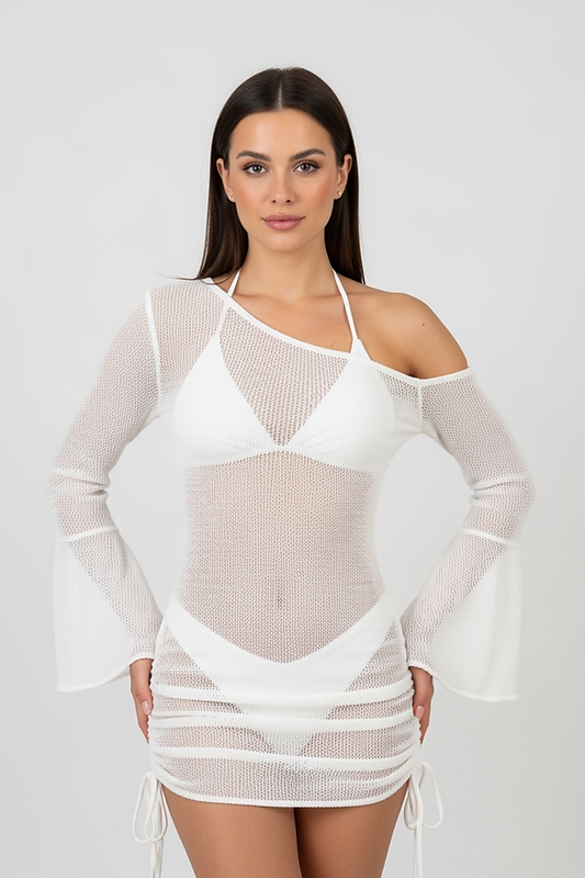 woman wearing black ruched mini dress, front view, standing, hands relaxed