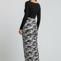 Stacked ruched patchwork print long-sleeve bodycon maxi dress, front view.