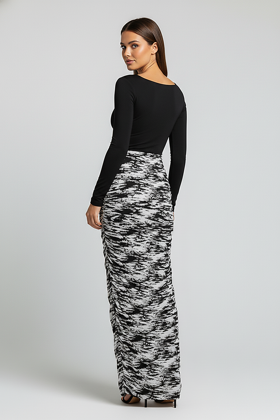 Stacked ruched long-sleeve patchwork print bodycon midi dress, front view on model.