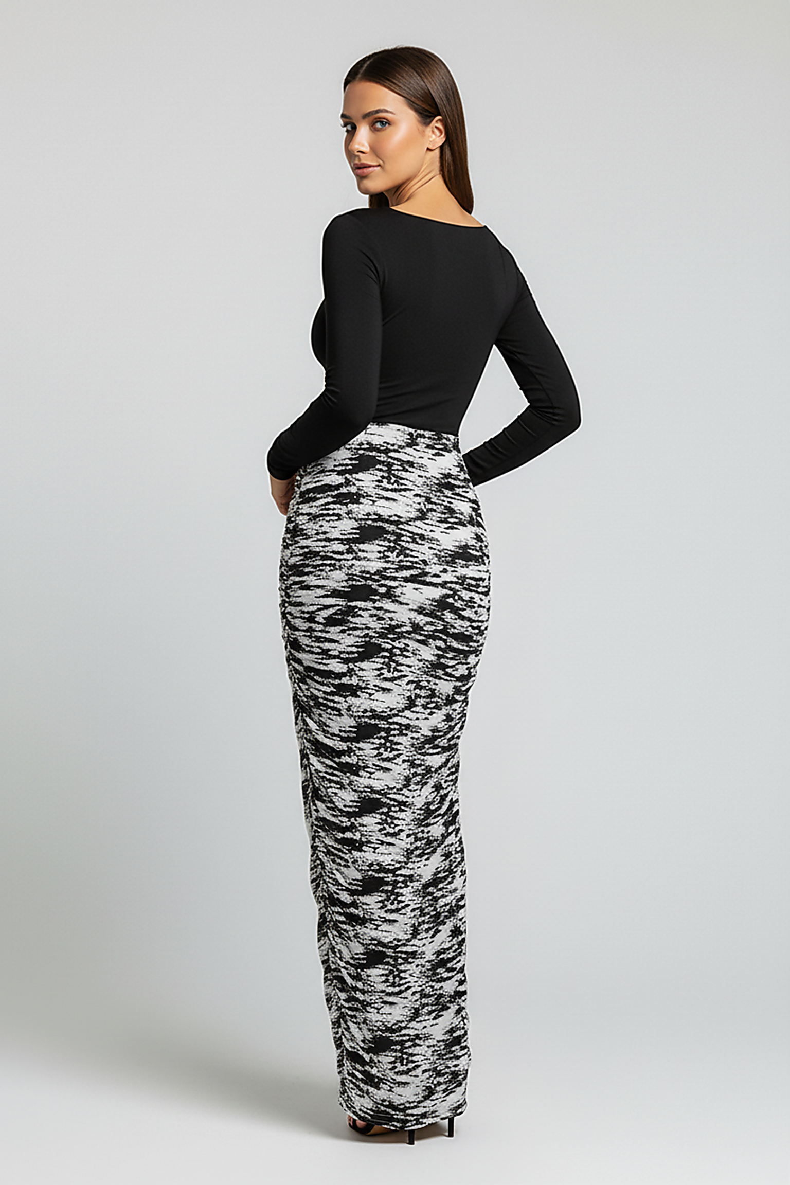 Stacked ruched long-sleeve patchwork print bodycon midi maxi dress, front view.
