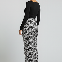 Stacked ruched patchwork print bodycon midi dress, front view on model.