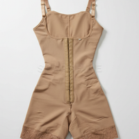 Beige tummy control fajas shapewear, alternate angle view on model.