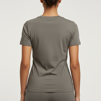 Olive green heavy cotton t-shirt, back view on model.