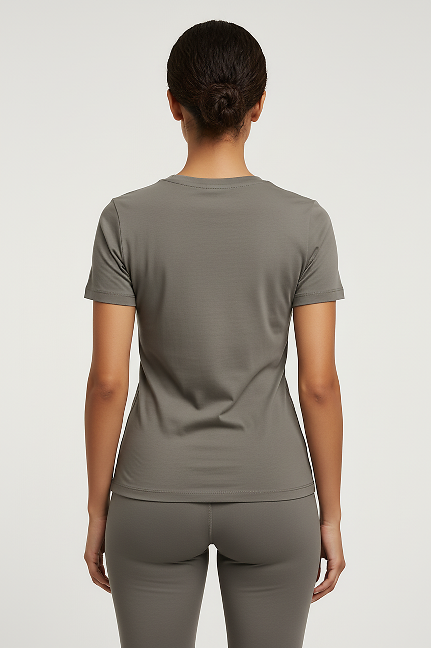 Olive green heavy cotton t-shirt, back view on model.