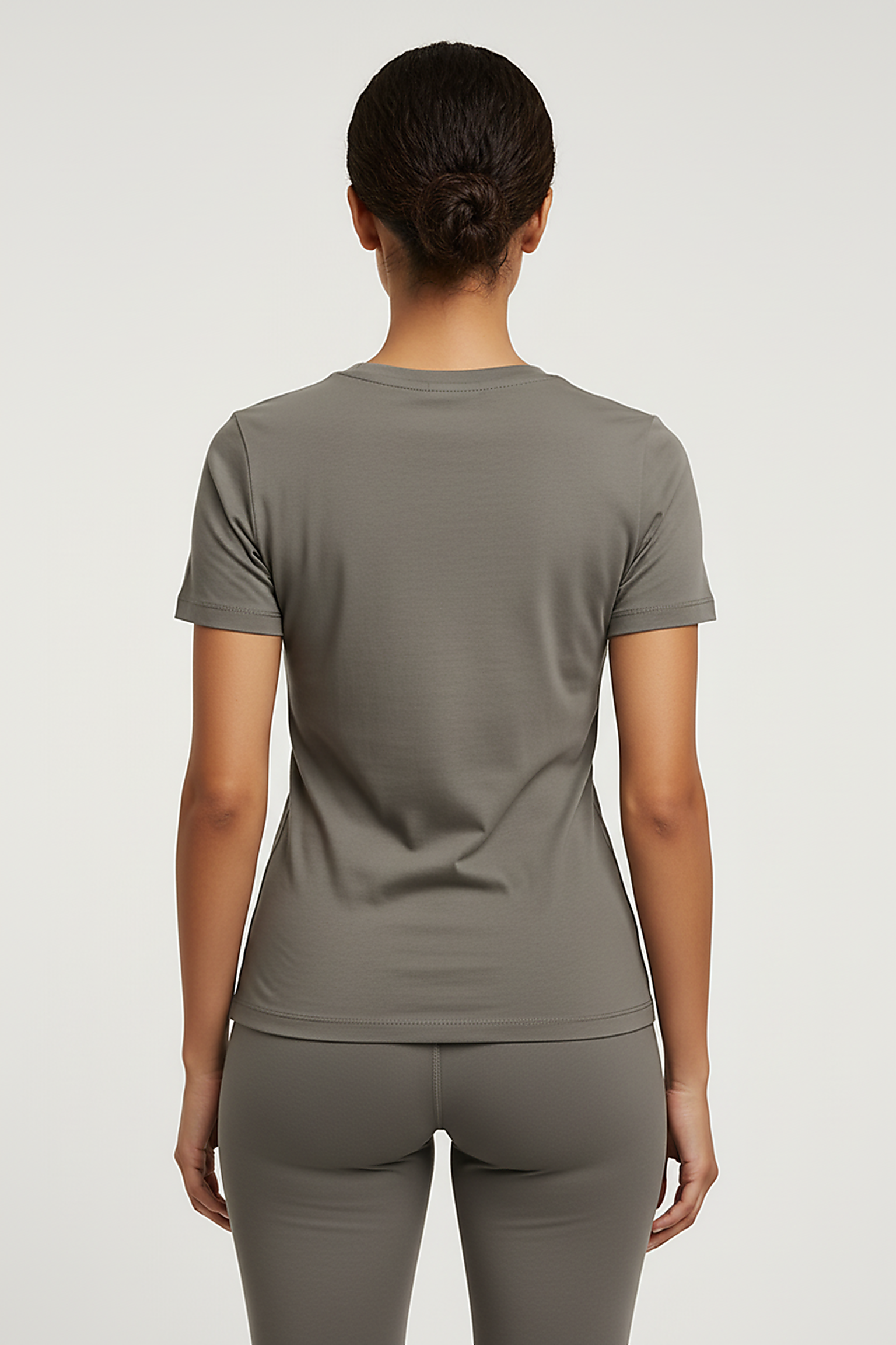 Olive green heavy cotton t-shirt, back view on model.