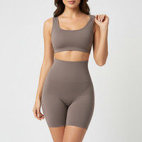 Black high-waist shaper, angled view on model.