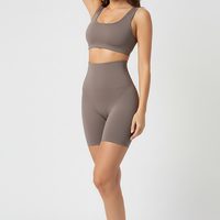 Black high-waist shaper, angled view on model.