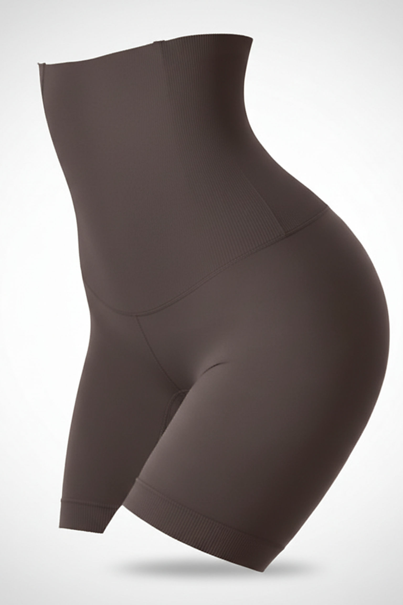 Black high-waist shaper, close-up fabric detail.