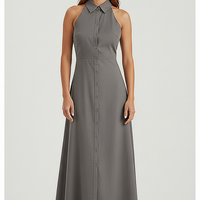 Front view of a woman wearing a dark grey collared halter maxi dress against a white background.; Full length view of a woman wearing a medium grey collared halter maxi dress.; Woman sitting on a