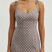 Polka dot sundress, back view on model.