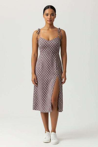 Polka dot sundress, side view on model.