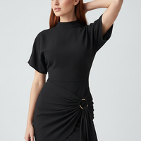 Solid O-neck bodycon mini dress with lace-up and metal buttons, on model.