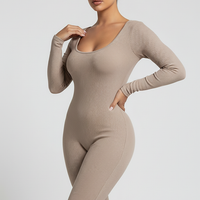 Black long-sleeve bodycon jumpsuit, back view on model.