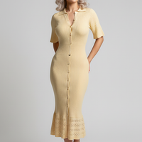 White knit long dress, O-neck, single-breasted. Front view on model.