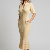 White slim-fit O-neck knit dress, short sleeve. Front view on model.