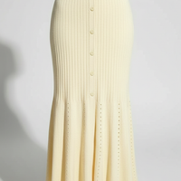 White knit long dress with short sleeves. Lifestyle shot.