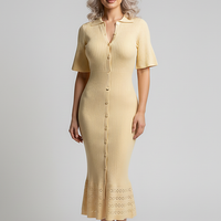 White O-neck single-breasted knit dress. Front view on model.