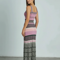 Black sleeveless knitted dress, alternate front view.