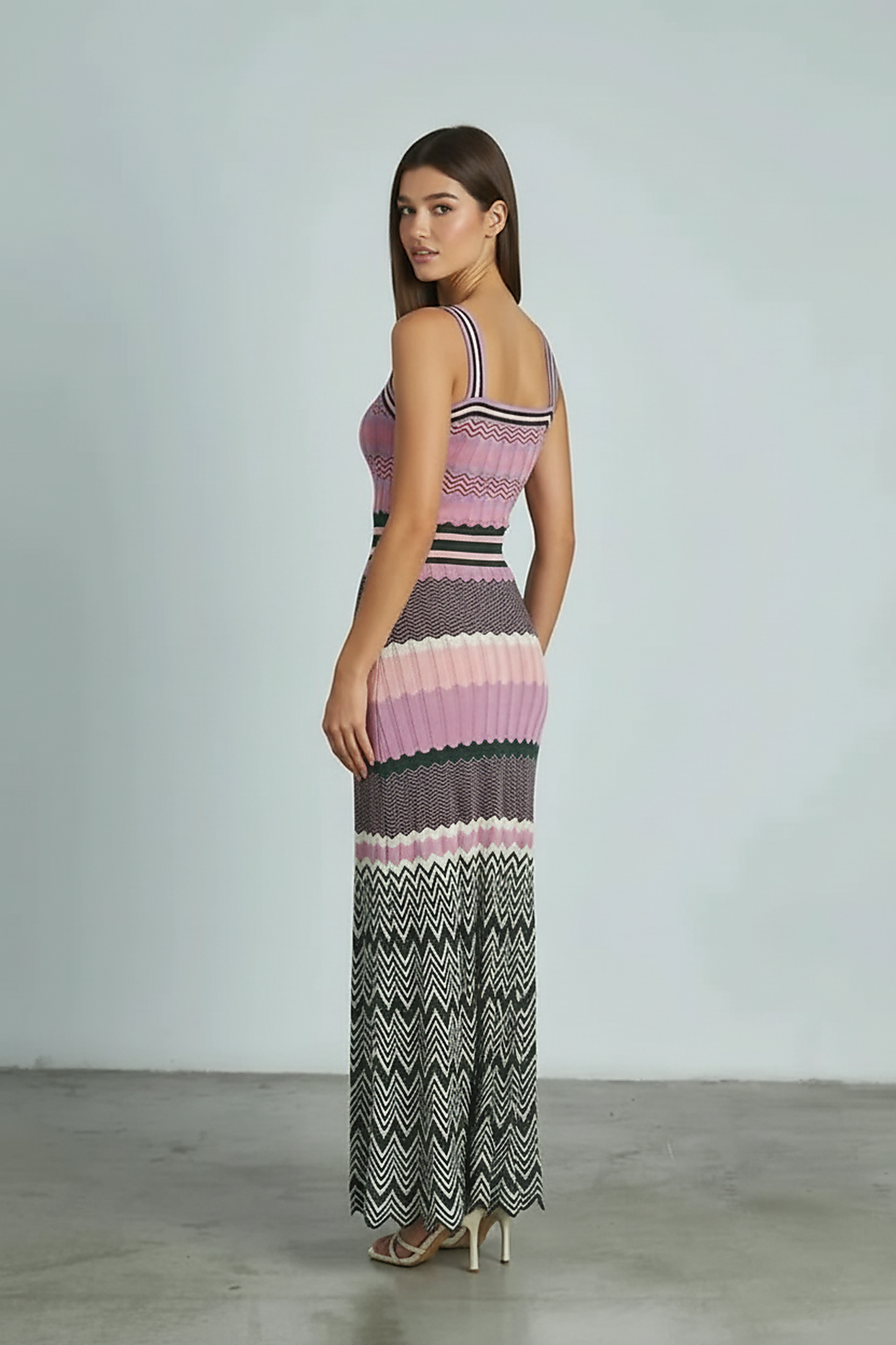 Black sleeveless knitted dress, alternate front view.