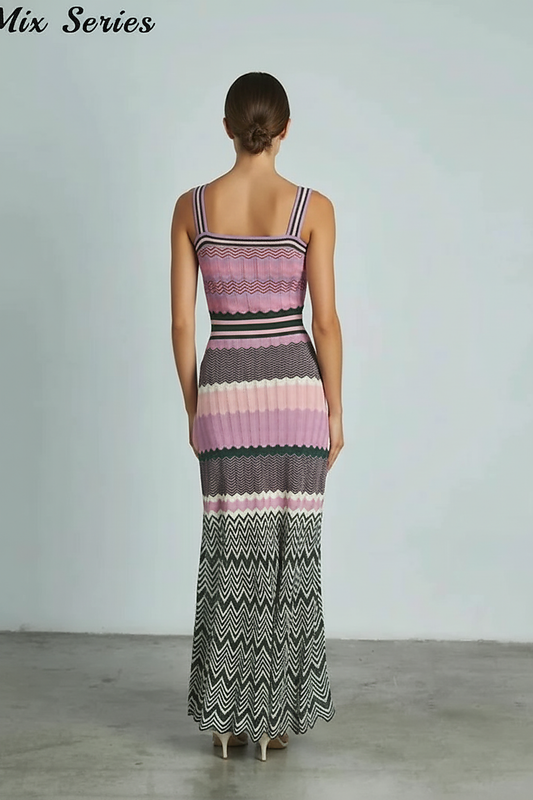 Black sleeveless knitted dress, side view on model.