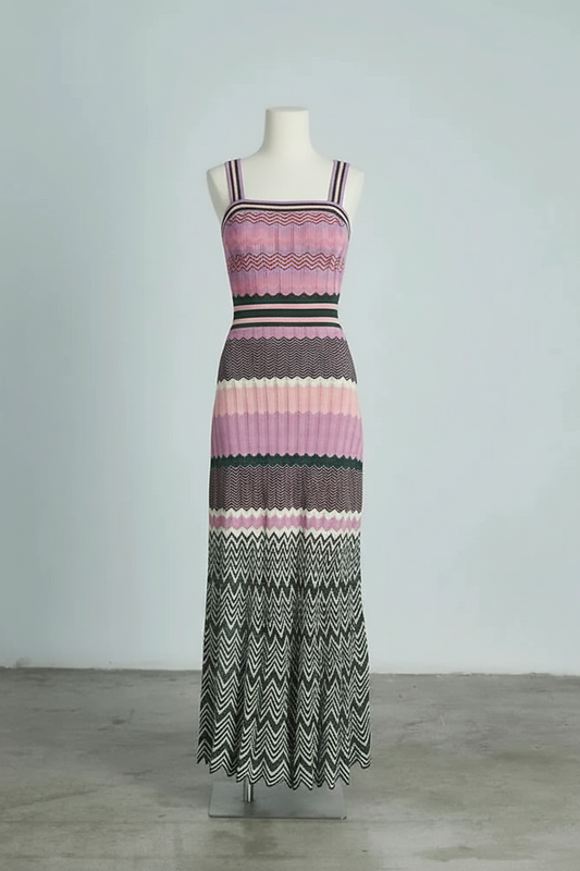 Black sleeveless knitted dress, close-up on model.