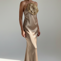 Halter mermaid satin dress with 3D flowers, back view on model.