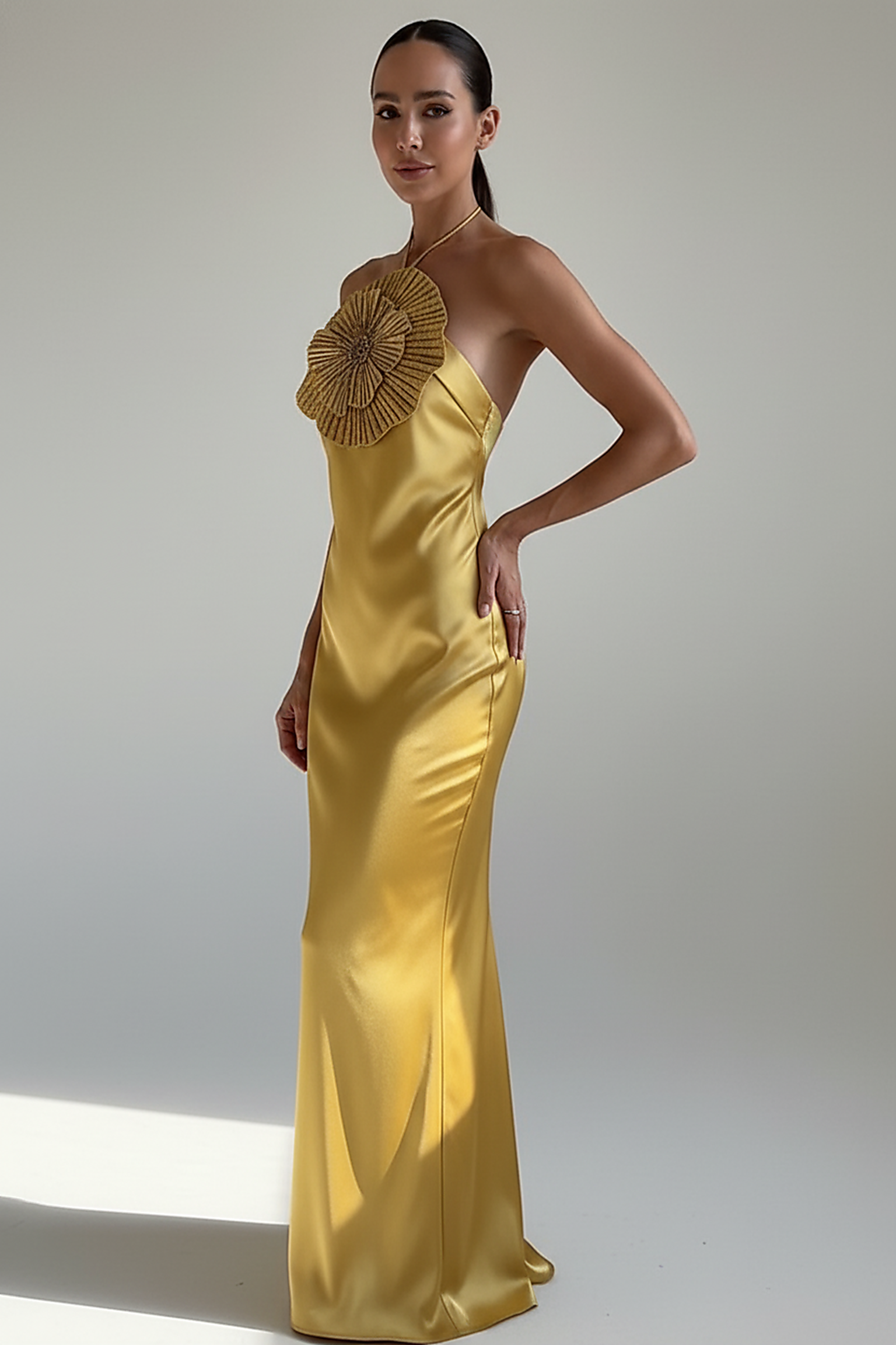 Halter mermaid satin dress with 3D flowers, front view on model.
