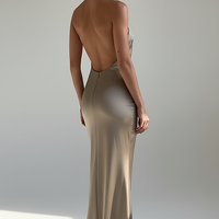 Halter mermaid satin dress with 3D flowers, back view on model.