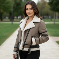 Cream synthetic sheepskin bomber jacket, open front on model.