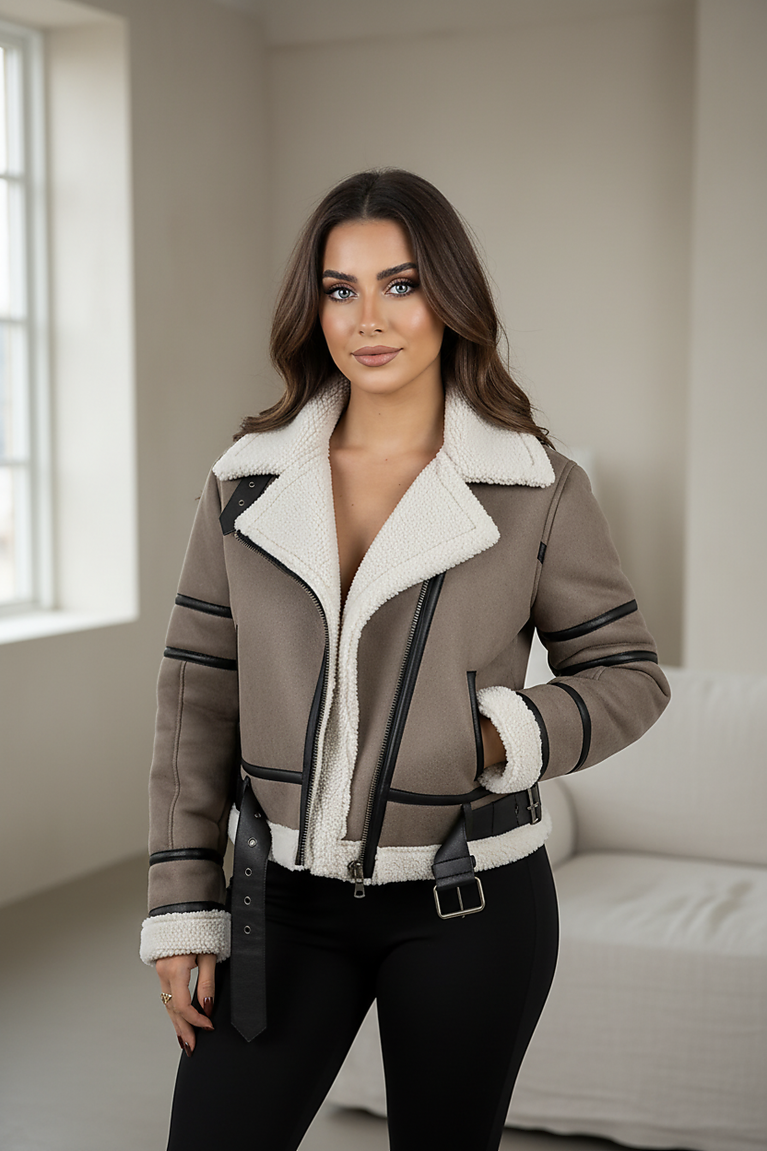 Cream synthetic sheepskin bomber jacket, collar and lapel detail.