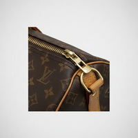 Cream synthetic sheepskin bomber jacket, sleeve cuff and hem detail.