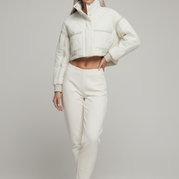 Stand-collar winter jacket, model in full length pose.