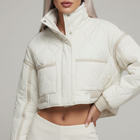 Stand-collar winter jacket, model in three-quarter pose.