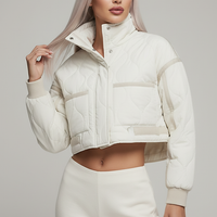 Stand-collar winter jacket, back view on model.