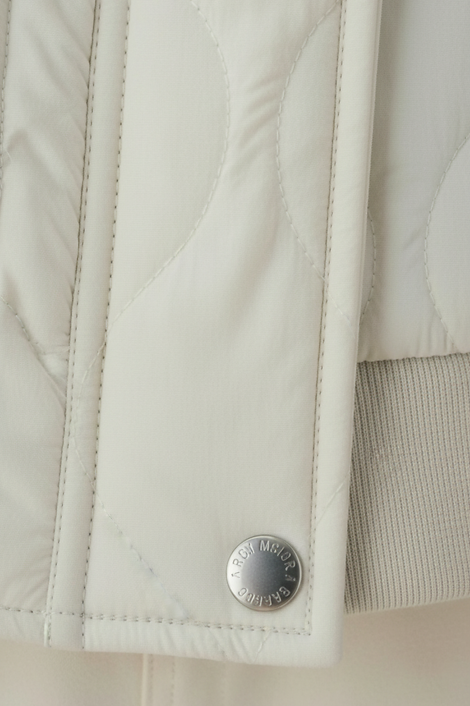 Stand-collar winter jacket, flat lay front view.