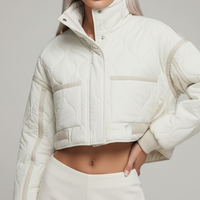 Stand-collar winter jacket, front view on model.